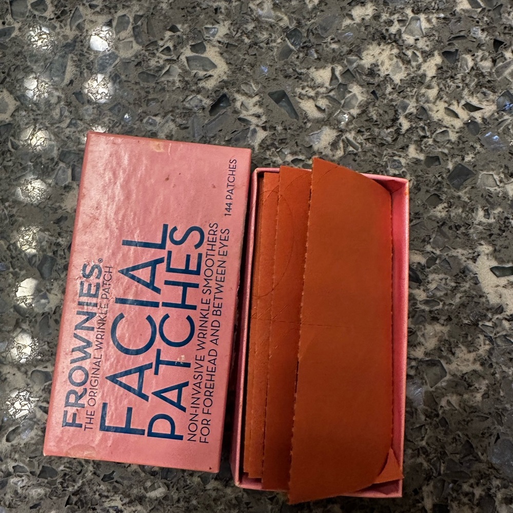 Frownies in box never used